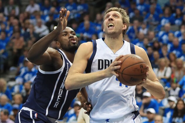 DALLAS, TX - APRIL 21:  Dirk Nowitzki #41 of the Dallas Mavericks dribbles the ball against Serge Ibaka #9 of the Oklahoma City Thunder during game three of the Western Conference Quarterfinals of the 2016 NBA Playoffs at American Airlines Center on April 21, 2016 in Dallas, Texas.  NOTE TO USER: User expressly acknowledges and agrees that, by downloading and or using this photograph, User is consenting to the terms and conditions of the Getty Images License Agreement.  (Photo by Ronald Martinez/Getty Images)
