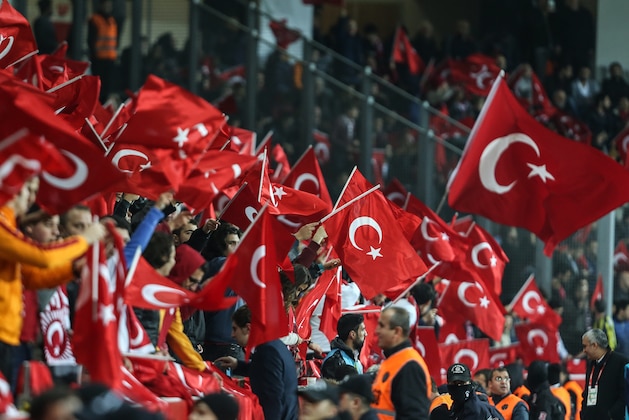 ISTANBUL, TURKEY -  NOVEMBER 17:  Turkish supporters wave flags during an international friendly soccer match between Greece and Turkey November 17, 2015  in Istanbul, Turkey. (Photo by Burak Kara/Getty Images)