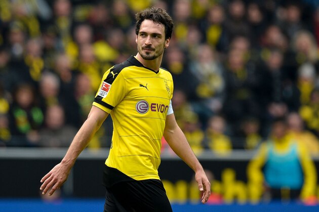 Dortmund's defender Mats Hummels reacts during the German first division Bundesliga football match Borussia Dortmund vs VfL Wolfsburg, in Dortmund, western Germany, on April 30, 2016. / AFP / Sascha SCHï¿½ï¿½ï¿½ï¿½ï¿½ï¿½RMANN / RESTRICTIONS: DURING MATCH TIME: DFL RULES TO LIMIT THE ONLINE USAGE TO 15 PICTURES PER MATCH AND FORBID IMAGE SEQUENCES TO SIMULATE VIDEO. == RESTRICTED TO EDITORIAL USE == FOR FURTHER QUERIES PLEASE CONTACT DFL DIRECTLY AT + 49 69 650050
        (Photo credit should read SASCHA SCHURMANN/AFP/Getty Images)