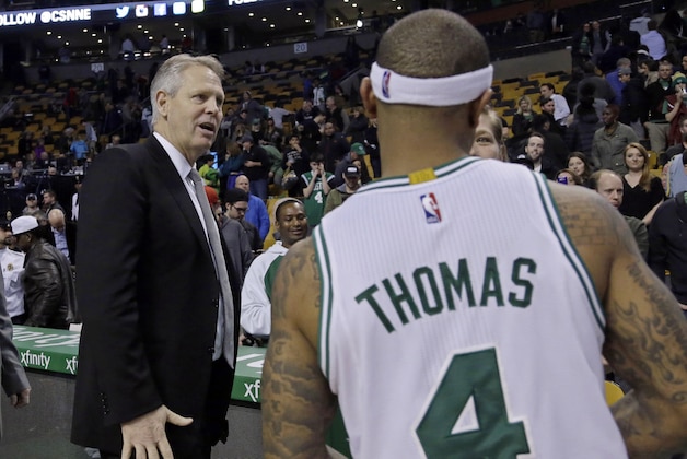 Boston Celtics president of basketball operations Danny Ainge chats with Celtics guard Isaiah Thomas (4) after an NBA basketball game against the Milwaukee Bucks, Thursday, Feb. 25, 2016, in Boston. The Celtics won 112-107. (AP Photo/Elise Amendola)