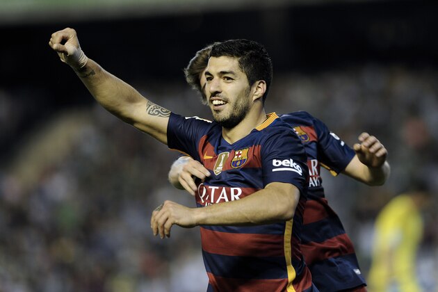 Barcelona's Uruguayan forward Luis Suarez celebrates after scoring a goal during the Spanish league football match Real Betis Balompie vs FC Barcelona at the Benito Villamarin stadium in Sevilla on April 30, 2016. / AFP / CRISTINA QUICLER        (Photo credit should read CRISTINA QUICLER/AFP/Getty Images)