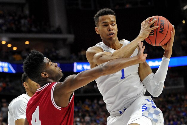 Mar 19, 2016; Des Moines, IA, USA; Kentucky Wildcats forward Skal Labissiere (1) grabs a rebound against Indiana Hoosiers guard Robert Johnson (4) in the first half during the second round of the 2016 NCAA Tournament at Wells Fargo Arena. Mandatory Credit: Steven Branscombe-USA TODAY Sports