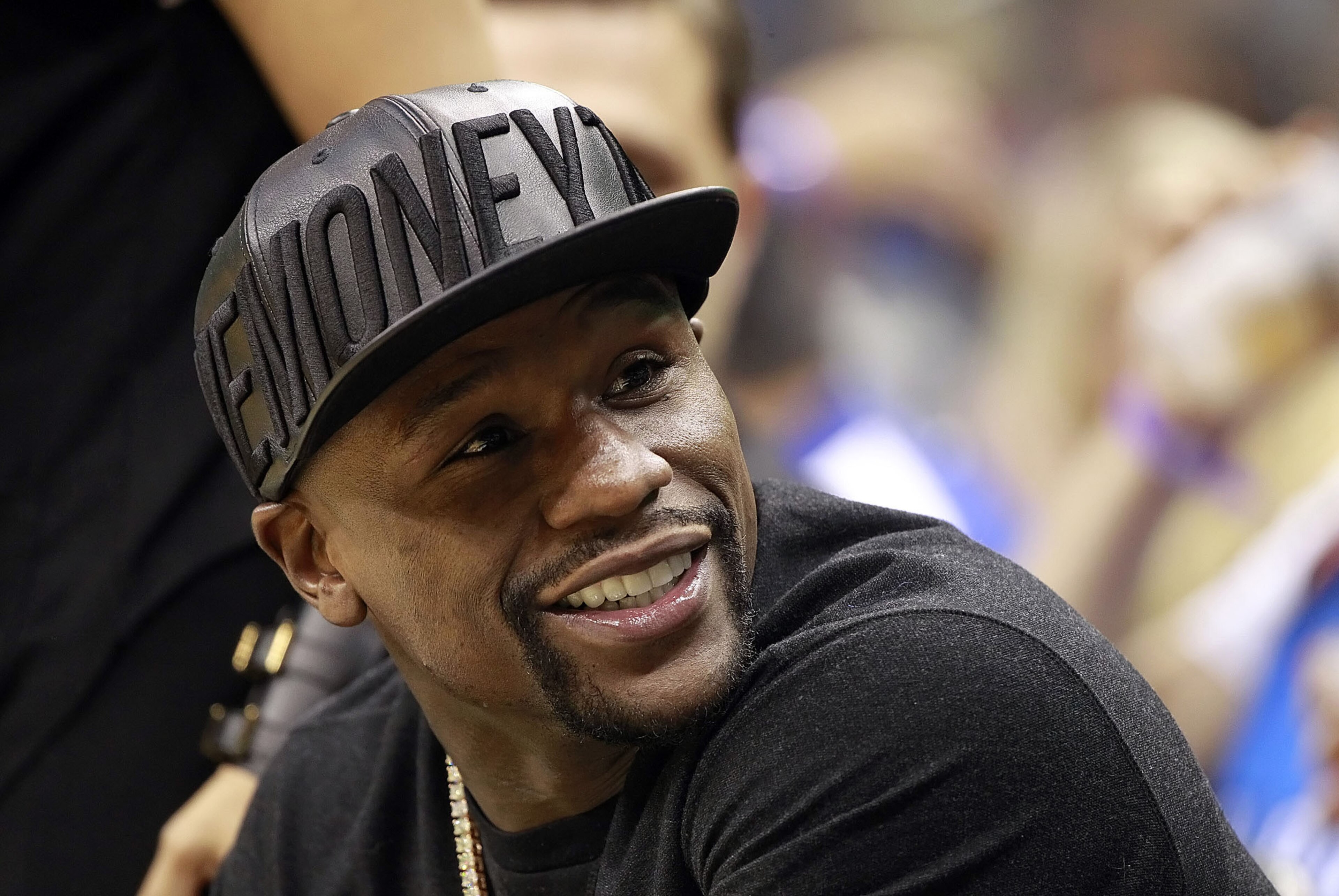 Oct 30, 2015; Orlando, FL, USA; American professional boxer Floyd Mayweather Jr. watches the Oklahoma City Thunder and Orlando Magic during the second quarter at Amway Center. Mandatory Credit: Kim Klement-USA TODAY Sports