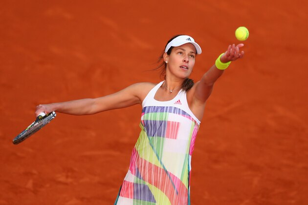 MADRID, SPAIN - MAY 01:  Ana Ivanovic of Serbia in action against Katerina Siniakova of Czech Republic during day two of the Mutua Madrid Open tennis tournament at the Caja Magica on May 01, 2016 in Madrid, Spain.  (Photo by Julian Finney/Getty Images)