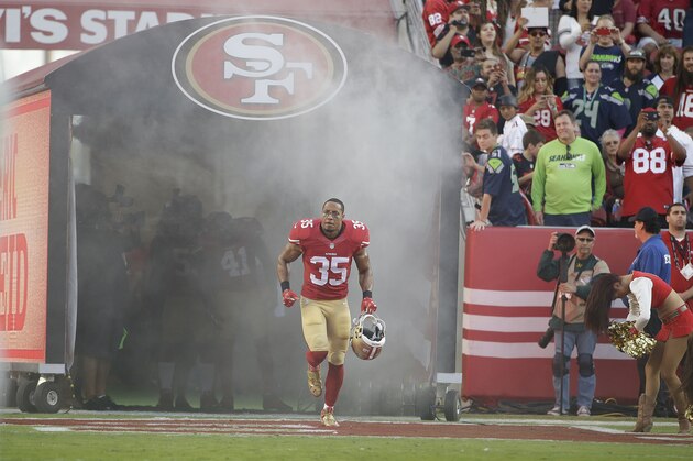 San Francisco 49ers safety Eric Reid (35) is introduced before an NFL football game against the Seattle Seahawks in Santa Clara, Calif., Thursday, Oct. 22, 2015. (AP Photo/Marcio Jose Sanchez)