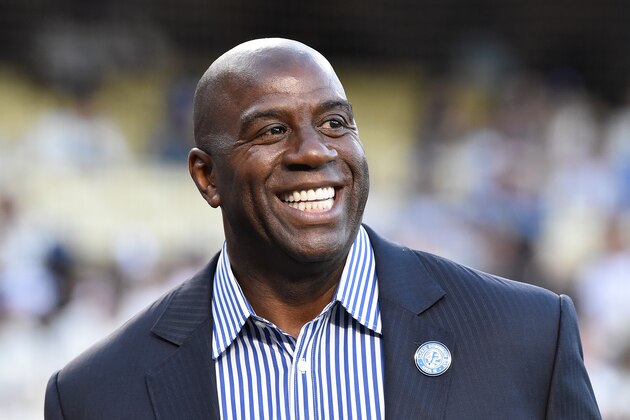 LOS ANGELES, CA - APRIL 15:  Magic Johnson attends a ceremony honoring Jackie Robinson before the game between the San Francisco Giants and the Los Angeles Dodgers at Dodger Stadium on April 15, 2016 in Los Angeles, California.  All players are wearing #42 in honor of Jackie Robinson Day. (Photo by Lisa Blumenfeld/Getty Images)