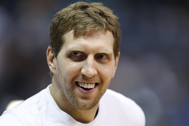 Dallas Mavericks' Dirk Nowitzki during team warm-ups before an NBA basketball game against the Memphis Grizzlies, Friday, April 8, 2016, in Dallas. (AP Photo/Jim Cowsert)