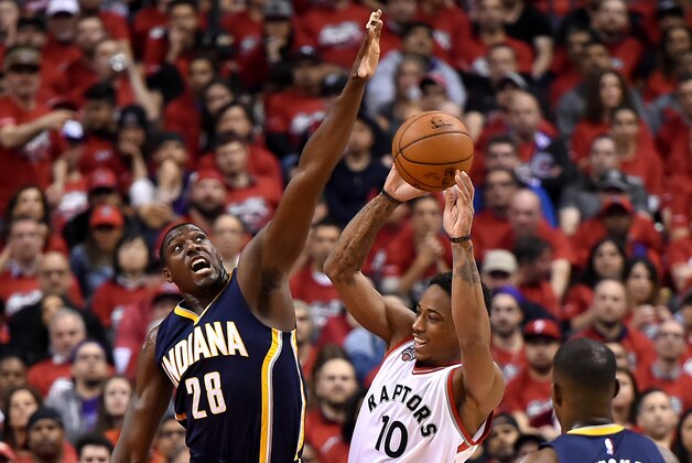 May 1, 2016; Toronto, Ontario, CAN;  Toronto Raptors guard DeMar DeRozan (10) tries for a shot as Indiana Pacers center Ian Mahinmi (28) defends in game seven of the first round of the 2016 NBA Playoffs at Air Canada Centre. Mandatory Credit: Dan Hamilton-USA TODAY Sports
