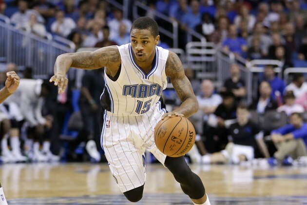 Orlando Magic guard Keith Appling (15) moves the ball against the Miami Heat during the second half of an NBA preseason basketball game, Tuesday, Oct. 13, 2015, in Orlando, Fla. Orlando won in overtime 95-92. (AP Photo/John Raoux)