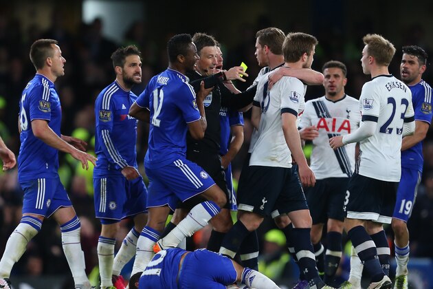 LONDON, ENGLAND - MAY 02 :  Referee Mark Clattenburg gets caught up in the melee as Eden Hazard of Chelsea lies injured during the Barclays Premier League match between Chelsea and Tottenham Hotspur at Stamford Bridge on May 2, 2016 in London, England.  (Photo by Catherine Ivill - AMA/Getty Images)