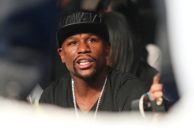 ORLANDO, FL - OCTOBER 30: World Champion boxer and current promoter Floyd Mayweather Jr. watches his fighter Gervonta Davis during the Premier Boxing Champions on Bounce TV boxing match at The Venue at UCF on October 30, 2015 in Orlando, Florida. (Photo by Alex Menendez/Getty Images)