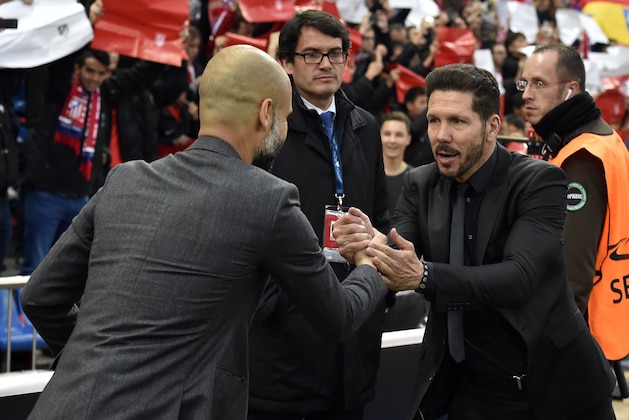 Atletico Madrid's Argentinian coach Diego Simeone()R shakes hands with Bayern Munich's Spanish head coach Pep Guardiola before the UEFA Champions League semifinal first leg football match Club Atletico de Madrid vs Bayern Munich at the Vicente Calderon stadium in Madrid on April 27, 2016. / AFP / GERARD JULIEN        (Photo credit should read GERARD JULIEN/AFP/Getty Images)