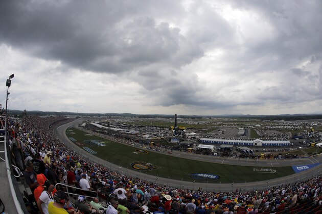 Storm clouds roll in as the NASCAR Talladega auto race begins at Talladega Superspeedway, Sunday, May 1, 2016, in Talladega, Ala. (AP Photo/John Bazemore)