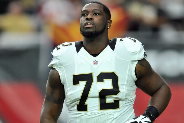 New Orleans Saints tackle (72) Terron Armstead heads for the sidelines before the start of a game the Arizona Cardinals defeated the Saints 31 to 19 in a game played at University of Phoenix Stadium in Glendale, Ariz. on Sunday, Sept. 13, 2015. (AP Photo/John Cordes)