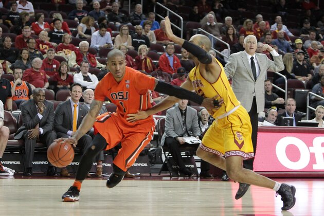 LOS ANGELES, CA - MARCH 02:  Gary Payton II #1 of the Oregon State Beavers handles the ball against Julian Jacobs #12 of the USC Trojans during a NCAA Pac12 college basketball game at Galen Center on March 2, 2016 in Los Angeles, California.  (Photo by Leon Bennett/Getty Images)