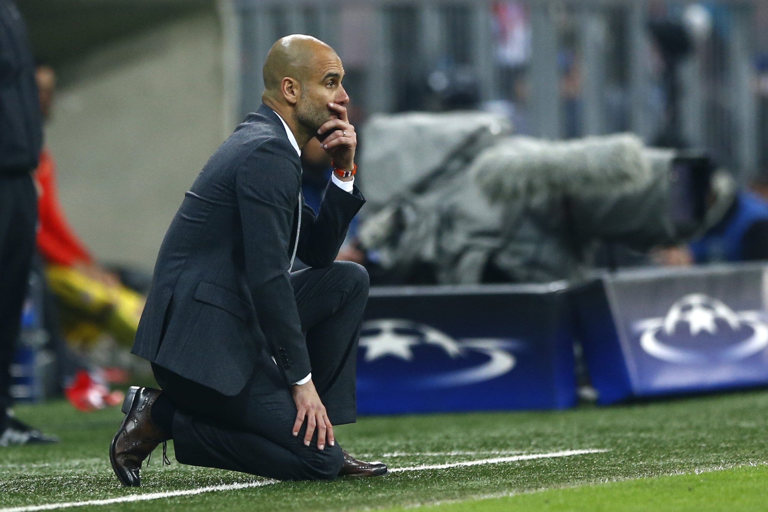 Bayern's head coach Pep Guardiola looks at the game during the Champions League second leg semifinal soccer match between Bayern Munich and Atletico de Madrid in Munich, Germany, Tuesday, May 3, 2016. (AP Photo/Matthias Schrader)