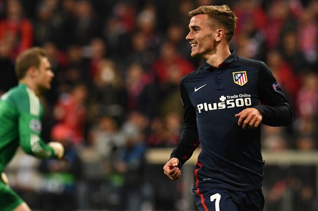 Atletico Madrid's French forward Antoine Griezmann celebrates scoring past Bayern Munich's goalkeeper Manuel Neuer during the UEFA Champions League semi-final, second-leg football match between FC Bayern Munich and Atletico Madrid in Munich, southern Germany, on May 3, 2016. / AFP / LUKAS BARTH        (Photo credit should read LUKAS BARTH/AFP/Getty Images)