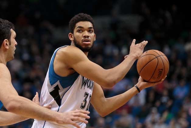 Apr 3, 2016; Minneapolis, MN, USA; Minnesota Timberwolves center Karl-Anthony Towns (32) looks to pass in the third quarter against the Dallas Mavericks at Target Center. The Dallas Mavericks beat the Minnesota Timberwolves 88-78. Mandatory Credit: Brad Rempel-USA TODAY Sports