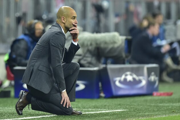 Bayern Munich's Spanish head coach Pep Guardiola follows the action during the UEFA Champions League semi-final, second-leg football match between FC Bayern Munich and Atletico Madrid in Munich, southern Germany, on May 3, 2016. / AFP / John MACDOUGALL        (Photo credit should read JOHN MACDOUGALL/AFP/Getty Images)