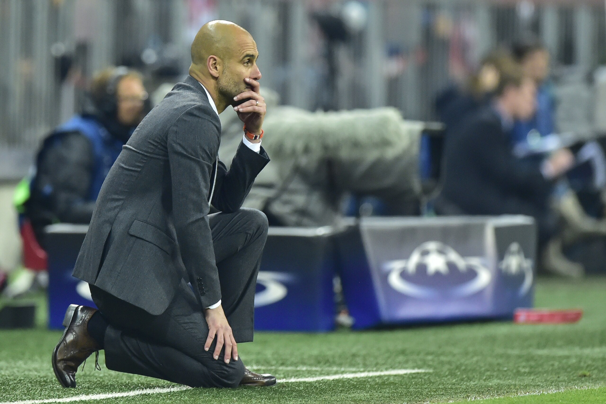 Bayern Munich's Spanish head coach Pep Guardiola follows the action during the UEFA Champions League semi-final, second-leg football match between FC Bayern Munich and Atletico Madrid in Munich, southern Germany, on May 3, 2016. / AFP / John MACDOUGALL        (Photo credit should read JOHN MACDOUGALL/AFP/Getty Images)