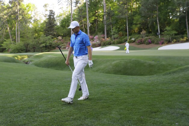 Jordan Spieth walks to the 14th tee during the final round of the Masters golf tournament Sunday, April 10, 2016, in Augusta, Ga. (AP Photo/Matt Slocum)