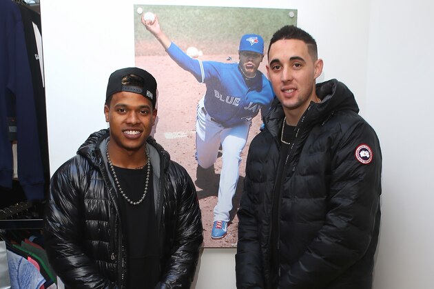 TORONTO, CANADA - FEBRUARY 13: Marcus Stroman #6 of the Toronto Blue Jays poses for a photo with Aaron Sanchez #41 of the Toronto Blue Jays in front of a wall-mounted print of Stroman of the Toronto Blue Jays at Emory Vegas Jones and Kelton Crenshaw's ASG '16 cashmere pack event on February 13, 2016 in Toronto, Canada.  (Photo by Tom Szczerbowski/Getty Images for New Era Cap Co.)