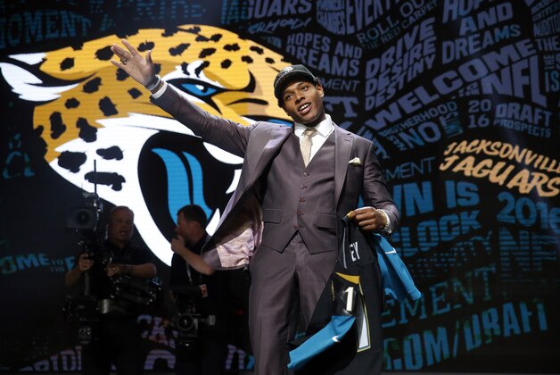 Florida State’s Jalen Ramsey poses for photos after being selected by Jacksonville Jaguars as fifth pick in the first round of the 2016 NFL football draft, Thursday, April 28, 2016, in Chicago. (AP Photo/Charles Rex Arbogast)