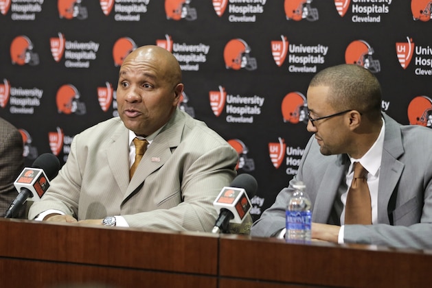 Cleveland Browns head coach Hue Jackson, center, answers questions during a news conference, Wednesday, Jan. 13, 2016, in Berea, Ohio. Browns owner Jimmy Haslam, left, and executive vice president of football operations Sashi Brown, right, listen. (AP Photo/Tony Dejak)