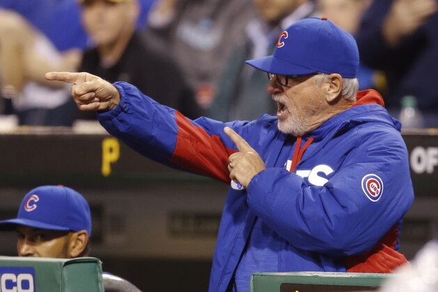 Chicago Cubs manager Joe Maddon yells toward Pittsburgh Pirates relief pitcher Kyle Lobstein after Cubs' Ben Zobrist was hit by a pitch in the seventh inning of a baseball game, Monday, May 2, 2016, in Pittsburgh. The Cubs won 7-2. (AP Photo/Keith Srakocic)