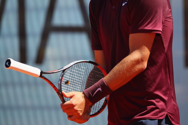 MADRID, SPAIN - MAY 03:  Bernard Tomic of Australia shows his emotion against Fabio Fognini of Italy in their first round match during day four of the Mutua Madrid Open tennis tournament at the Caja Magica on May 03, 2016 in Madrid,Spain.  (Photo by Clive Brunskill/Getty Images)