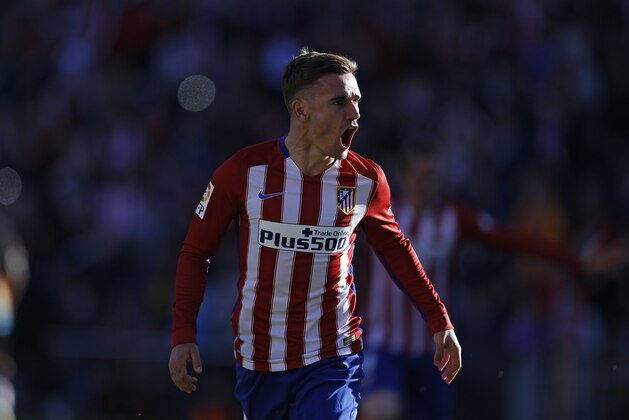 Atletico Madrid's Antoine Griezmann celebrates after scoring the opening goal against Rayo Vallecano during a Spanish La Liga soccer match between Atletico and Rayo Vallecano at the Vicente Calderon stadium in Madrid, Saturday, April 30, 2016. Griezmann scored once in Atletico's 1-0 victory. (AP Photo/Francisco Seco)