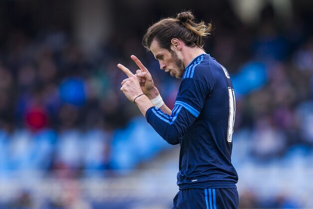 SAN SEBASTIAN, SPAIN - APRIL 30:  Gareth Bale of Real Madrid celebrates after scoring goal during the La Liga match between Real Sociedad de Futbol and Real Madrid at Estadio Anoeta on April 30, 2016 in San Sebastian, Spain.  (Photo by Juan Manuel Serrano Arce/Getty Images)