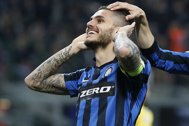 Inter Milan's Mauro Icardi celebrates after scoring during the Serie A soccer match between Inter Milan and Napoli at the San Siro stadium in Milan, Italy, Saturday, April 16, 2016. (AP Photo/Antonio Calanni)
