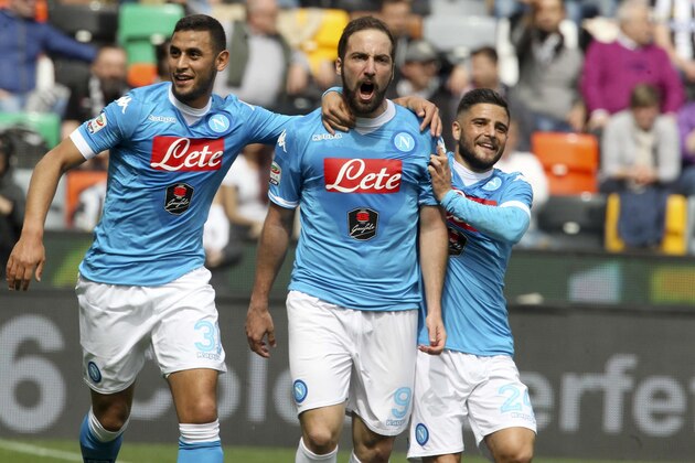 Napoli's Gonzalo Higuain, center, celebrates with his teammates Faouzi Ghoulam, left, and Lorenzo Insigne after scoring during a Serie A soccer match between Udinese and Napoli at the Friuli stadium, in Udine, Italy, Sunday, 3 April 2016. (Lancia/ANSA via AP) ITALY OUT Napoli's Gonzalo Higuain, center, celebrates with his teammates Faouzi Ghoulam, left, and Lorenzo Insigne after scoring during a Serie A soccer match between Udinese and Napoli at the Friuli stadium, in Udine, Italy, Sunday, 3 April 2016. (Lancia/ANSA via AP) ITALY OUT