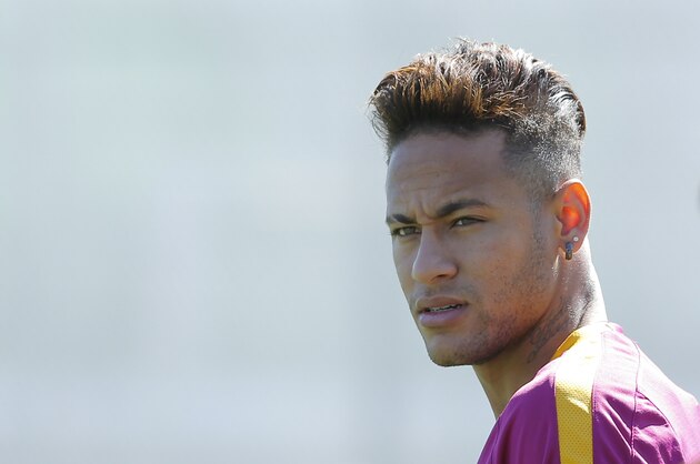 FC Barcelona's Neymar attends a training session at the Sports Center FC Barcelona Joan Gamper in Sant Joan Despi, Spain, Saturday, April 16, 2016. (AP Photo/Manu Fernandez)