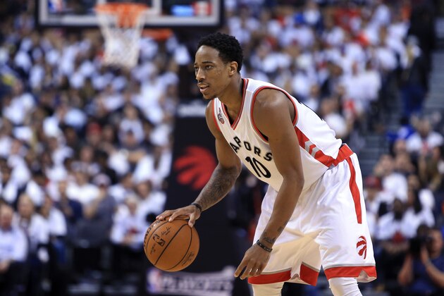 TORONTO, ON - MAY 03:  DeMar DeRozan #10 of the Toronto Raptors dribbles the ball in the second half of Game One of the Eastern Conference Semifinals against the Miami Heat during the 2016 NBA Playoffs at the Air Canada Centre on May 3, 2016 in Toronto, Ontario, Canada.  NOTE TO USER: User expressly acknowledges and agrees that, by downloading and or using this photograph, User is consenting to the terms and conditions of the Getty Images License Agreement.  (Photo by Vaughn Ridley/Getty Images)