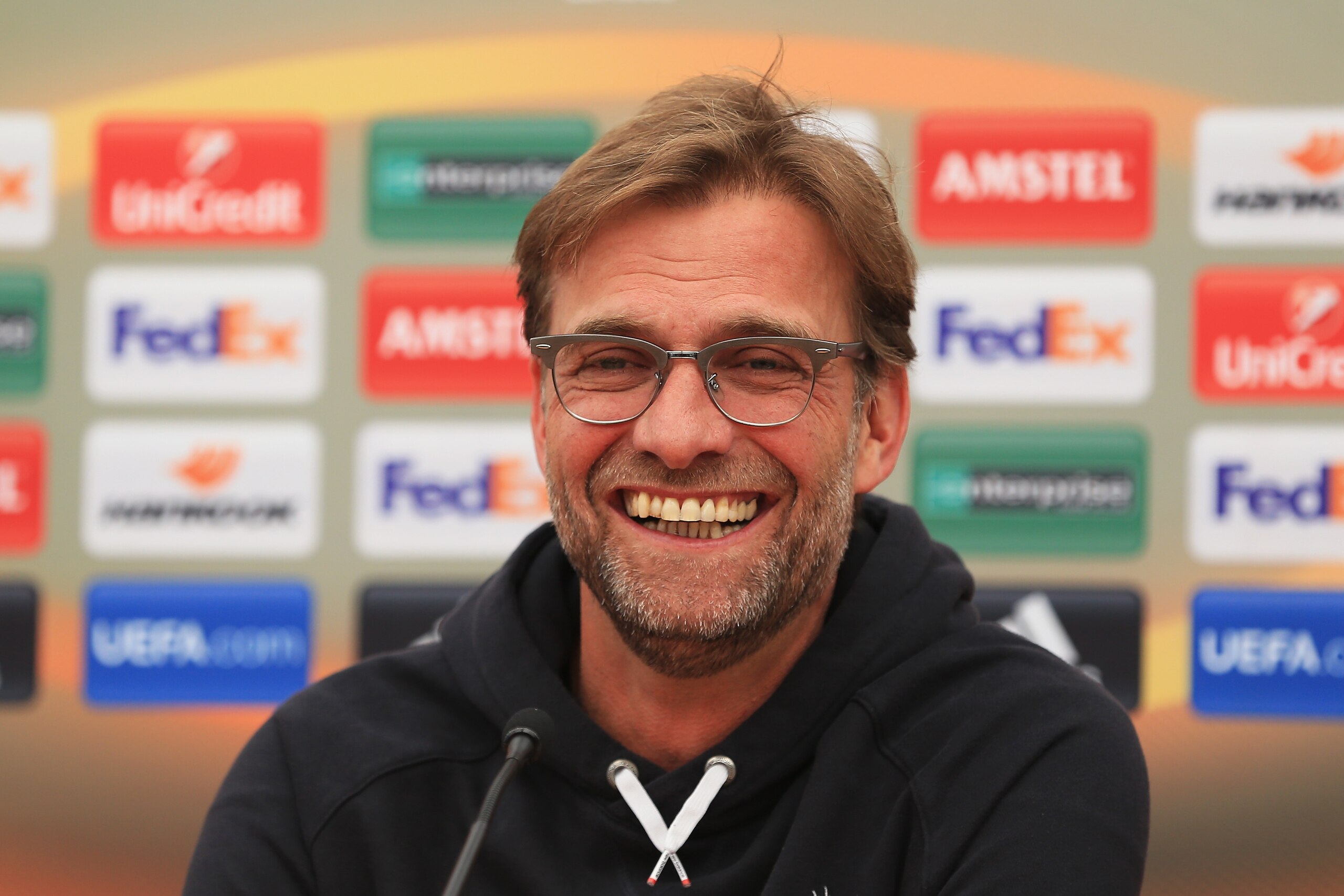 LIVERPOOL, ENGLAND - MAY 04:  Jurgen Klopp, manager of Liverpool smiles during a press conference ahead of the UEFA Europa League Semi-Final Second Leg match against Villarreal at Melwood Training Ground on May 4, 2016 in Liverpool, England.  (Photo by Clint Hughes/Getty Images)