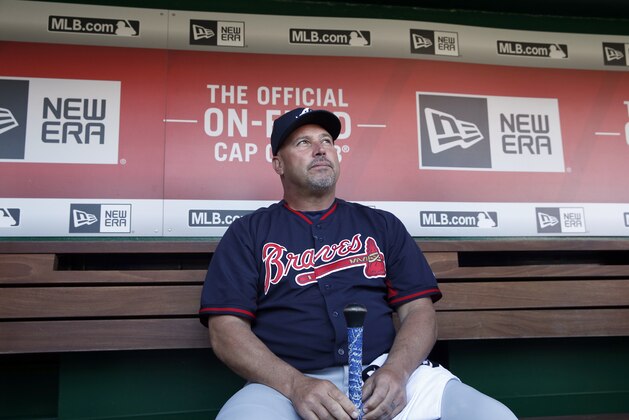 Atlanta Braves manager Fredi Gonzalez pauses while talking with the media before a baseball game against the Washington Nationals at Nationals Park, Wednesday, April 13, 2016, in Washington. Braves outfielder Hector Olivera was placed on paid administrative leave by Major League Baseball after he was arrested when a woman accused him of assault at a hotel outside Washington. (AP Photo/Alex Brandon)