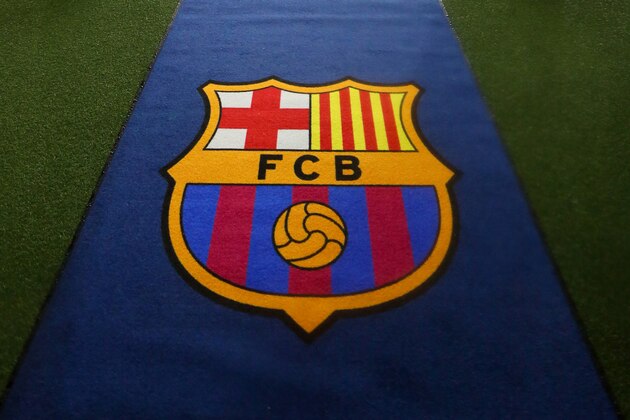 BARCELONA, SPAIN - MARCH 16:  The FC Barcelona club badge on the Road to Milano UEFA Champions League mat before the UEFA Champions League match between FC Barcelona and Arsenal at Camp Nou on March 16, 2016 in Barcelona, Spain.  (Photo by Catherine Ivill - AMA/Getty Images)
