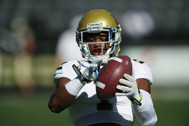 UCLA defensive back Ishmael Adams warms up before facing Colorado in the first quarter of an NCAA football game in Boulder, Colo., on Saturday, Oct. 25, 2014. (AP Photo/David Zalubowski)