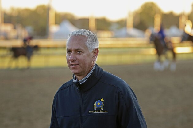 FILE - In this April 29, 2015, file photo, trainer Todd Pletcher watches horses on the track at Churchill Downs in Louisville, Ky. Pletcher became the 10th thoroughbred trainer to reach 4,000 victories when Eagle Scout won the fifth race at Gulfstream Park on Friday, March 18, 2016. (AP Photo/Charlie Riedel, File)