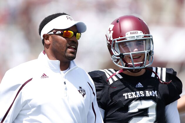 COLLEGE STATION, TX - APRIL 13:  Head coach Kevin Sumlin of the Texas A&M Aggies chats with his quarterback Johnny Manziel #2 before the Maroon & White spring football game at Kyle Field on April 13, 2013 in College Station, Texas.  (Photo by Scott Halleran/Getty Images)