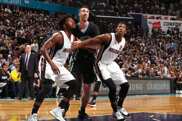 CHARLOTTE, NC - APRIL 23:  Justise Winslow #20 and Josh Richardson #0 of the Miami Heat box out Frank Kaminsky III #44 of the Charlotte Hornets during Game Three of the Eastern Conference Quarterfinals during the 2016 NBA Playoffs on April 23, 2016 at Time Warner Cable Arena in Charlotte, North Carolina. NOTE TO USER: User expressly acknowledges and agrees that, by downloading and or using this Photograph, user is consenting to the terms and conditions of the Getty Images License Agreement. Mandatory Copyright Notice: Copyright 2016 NBAE (Photo by Kent Smith/NBAE via Getty Images)
