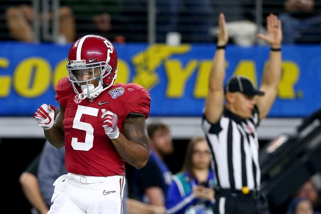 ARLINGTON, TX - DECEMBER 31:  Cyrus Jones #5 of the Alabama Crimson Tide celebrates after returning a punt for a 57 yard touchdown in the third quarter against the Michigan State Spartans during the Goodyear Cotton Bowl at AT&T Stadium on December 31, 2015 in Arlington, Texas.  (Photo by Tom Pennington/Getty Images)