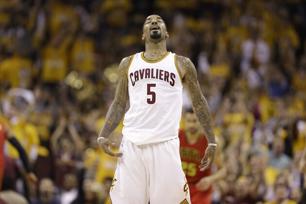 Cleveland Cavaliers guard J.R. Smith (5) reacts after hitting a 3-point shot against the Atlanta Hawks in the first half during Game 2 of a second-round NBA basketball playoff series, Wednesday, May 4, 2016, in Cleveland. (AP Photo/Tony Dejak)