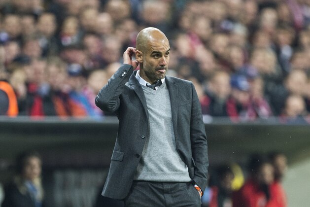 Bayern Munich's coach Pep Guardiola reacts during the UEFA Champions League semi-final, second-leg football match between FC Bayern Munich and Atletico Madrid in Munich, southern Germany, on May 3, 2016. / AFP / JOHN MACDOUGALL        (Photo credit should read JOHN MACDOUGALL/AFP/Getty Images)