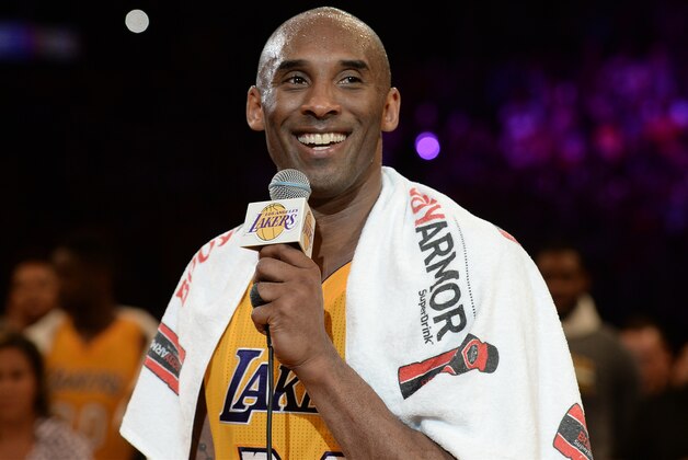 Apr 13, 2016; Los Angeles, CA, USA; Los Angeles Lakers forward Kobe Bryant (24) smiles as he addresses the crowd after the Lakers defeat of the Utah Jazz in the final game of his career at Staples Center. Mandatory Credit: Robert Hanashiro-USA TODAY Sports