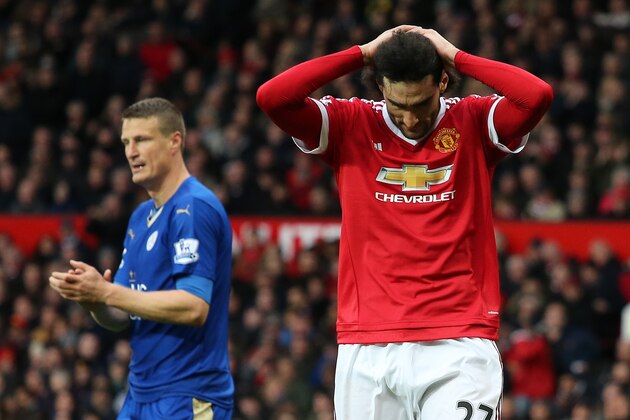 MANCHESTER, ENGLAND - MAY 01: Marouane Fellaini of Manchester United puts his hands on his head an pulls back his hair during the Barclays Premier League match between Manchester United and  Leicester City at Old Trafford on May 1, 2016 in Manchester, United Kingdom. (Photo by Matthew Ashton - AMA/Getty Images)