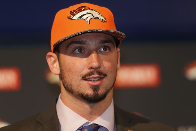 Denver Broncos' first-round selection in the NFL football draft, quarterback Paxton Lynch from Memphis, is introduced Friday, April 29, 2016, in the team's headquarters in Englewood, Colo. (AP Photo/David Zalubowski)