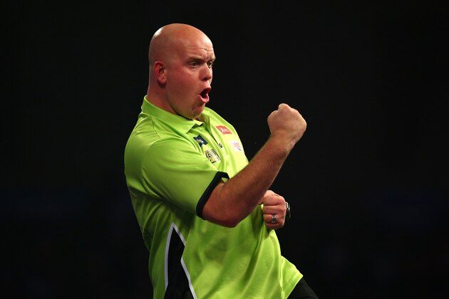 LONDON, ENGLAND - DECEMBER 27: Michael van Gerwen of Holland celebrates winning a leg during his second round match against Darren Webster of England during the 2016 William Hill PDC World Darts Championships on Day Nine at Alexandra Palace on December 27, 2015 in London, England. (Photo by Charlie Crowhurst/Getty Images)